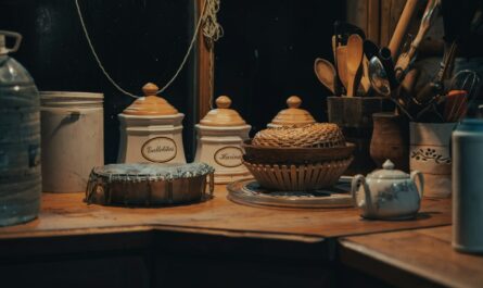 brown and white ceramic container on brown wooden table